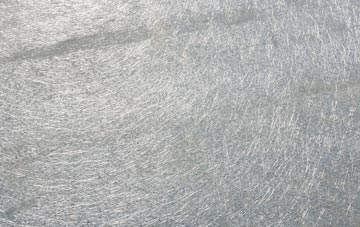 Caulside laminate fibreglass or shingles?